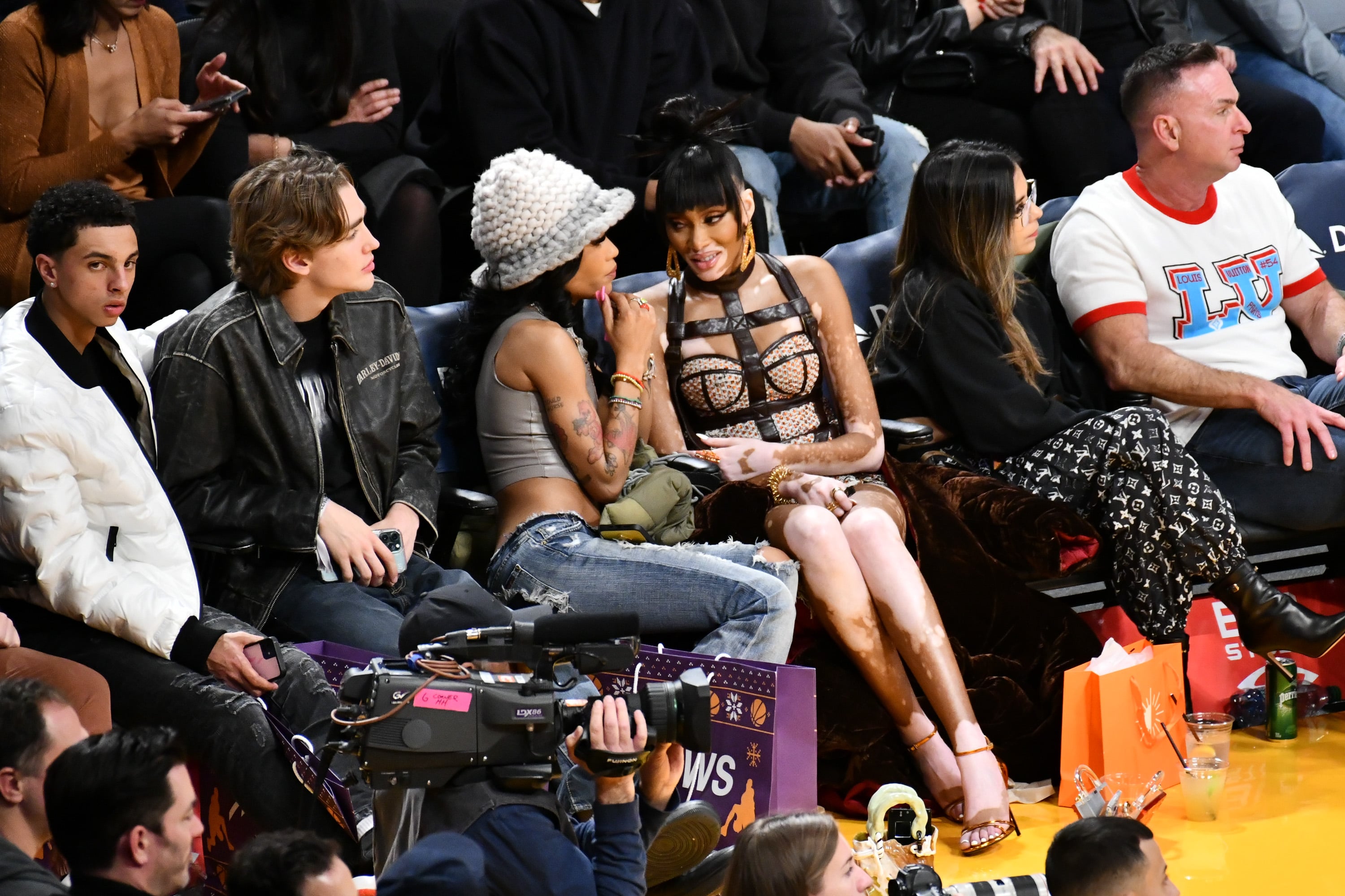 Winnie Harlow Soars in 6-Inch Sandals & Corset Dress at Lakers