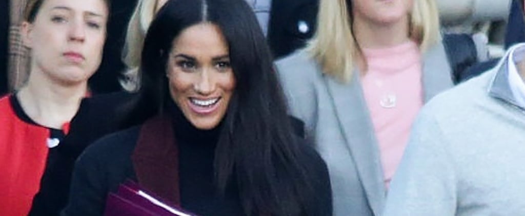 Meghan Markle's Black Coat With Maroon Trim October 2018
