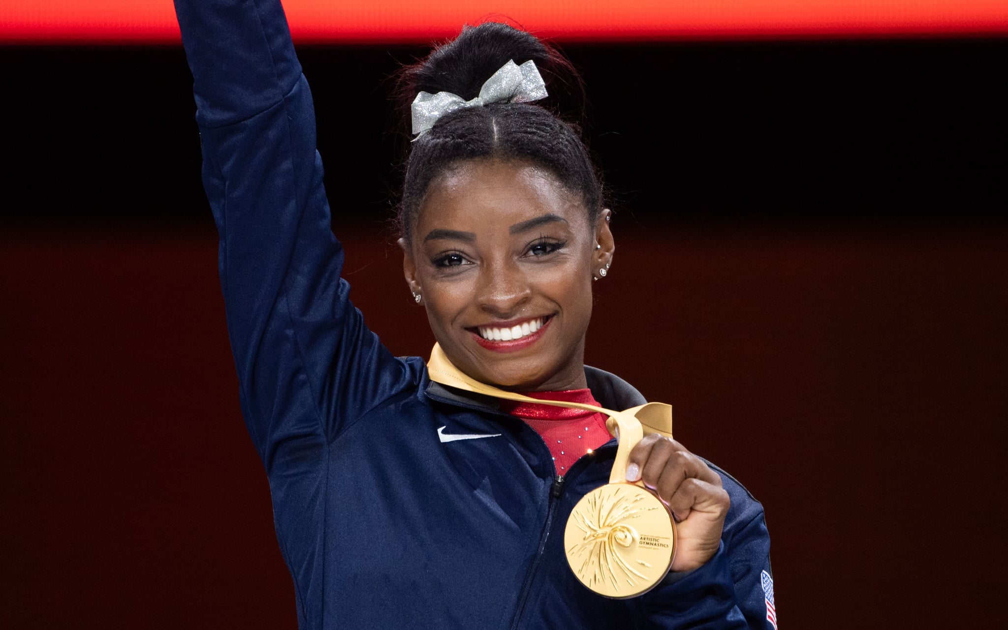 12 October 2019, Baden-Wuerttemberg, Stuttgart: Gymnastics: world championship, jump, final, women: Simone Biles from the USA at the award ceremony with the gold medal Photo: Marijan Murat/dpa (Photo by Marijan Murat/picture alliance via Getty Images)