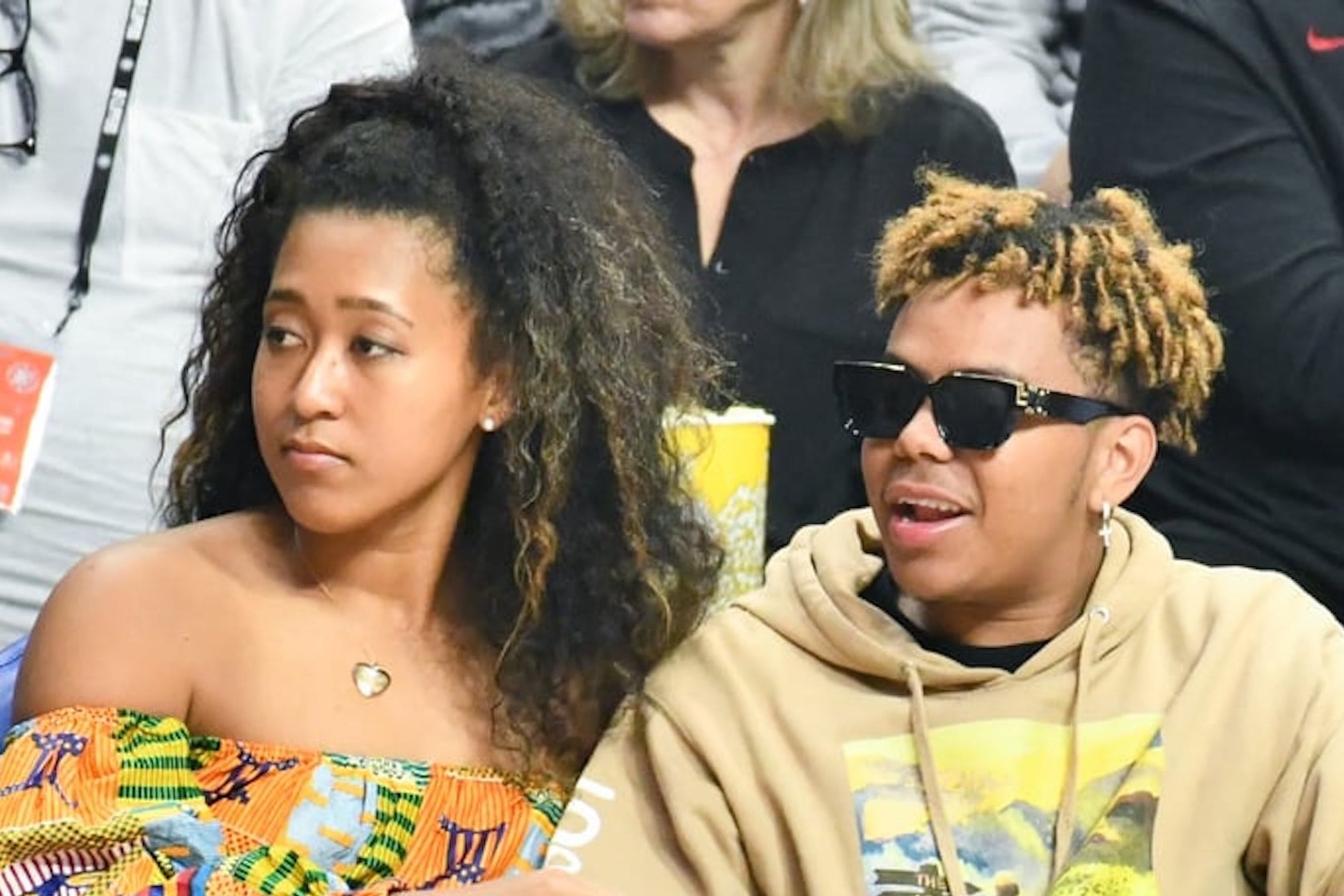 Naomi Osaka models stylish leopard print dress as she and beau Cordae lead  stars at Lakers game