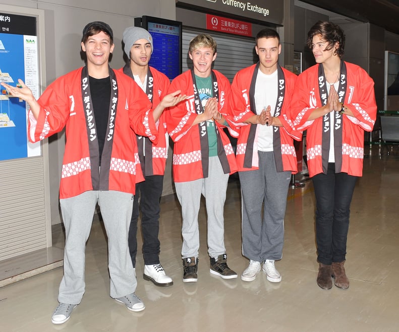 One Direction at Tokyo Narita Airport in 2013