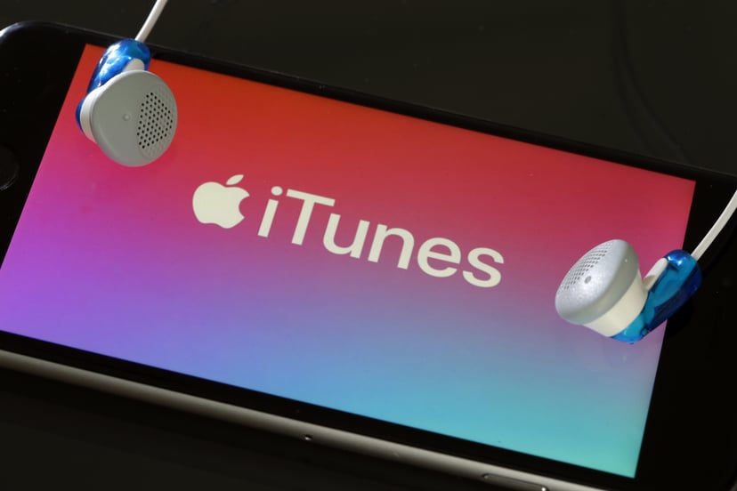 PARIS, FRANCE - JUNE 03: In this photo illustration, the logo of the multimedia application iTunes is displayed on the screen of an Apple iPhone on June 03, 2019 in Paris, France. The multimedia application iTunes should disappear tonight at the end of th