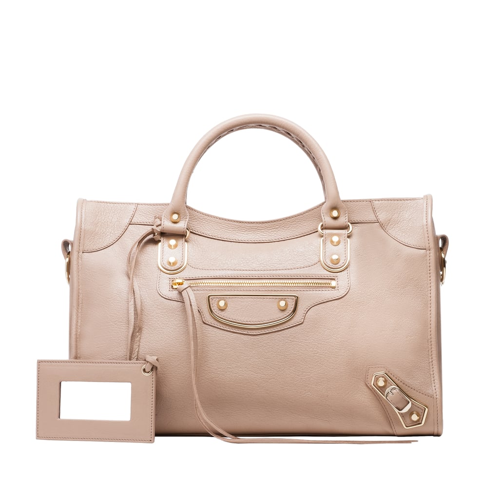 I absolutely love the Balenciaga City Bag ($2,125) with the metallic edge from the label's holiday collection. The rosy shade is so perfect for every season, it's a must-have bag I'll wear for the rest of my life.

— SW
