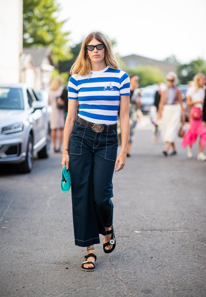 Top a pair of wide-leg pants with a fitted tee to balance out your proportions