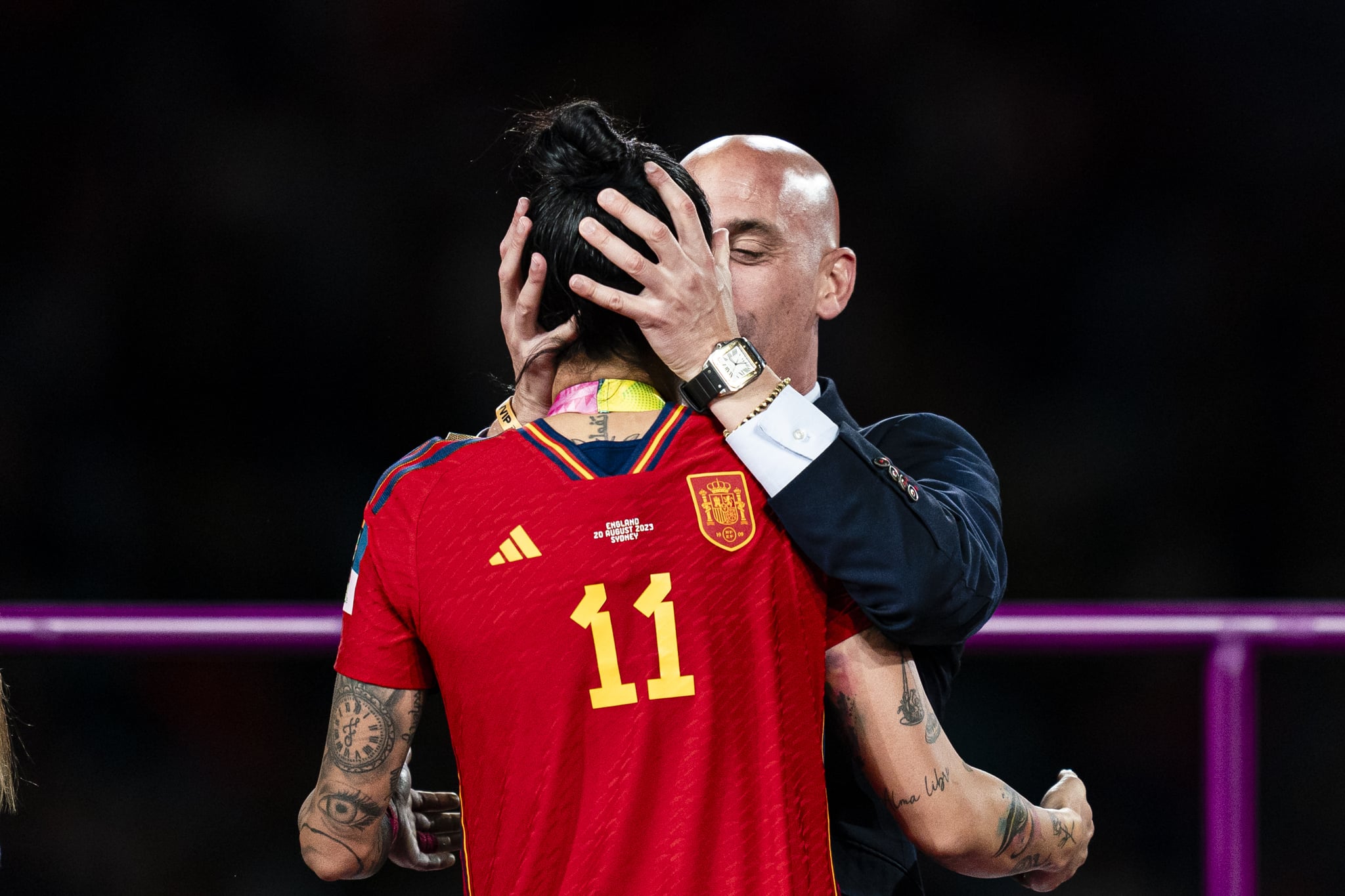 SYDNEY, AUSTRALIA - AUGUST 20: President of the Royal Spanish Football Federation Luis Rubiales (R) kisses Jennifer Hermoso of Spain (L) during the medal ceremony of FIFA Women's World Cup Australia & New Zealand 2023 Final match between Spain and England at Stadium Australia on August 20, 2023 in Sydney, Australia. (Photo by Noemi Llamas/Eurasia Sport Images/Getty Images)