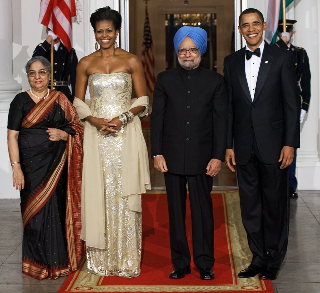 Wearing Naeem Khan at the state dinner with Indian Prime Minister Manmohan Singh and his wife, Gursharan Kaur, in 2009.

