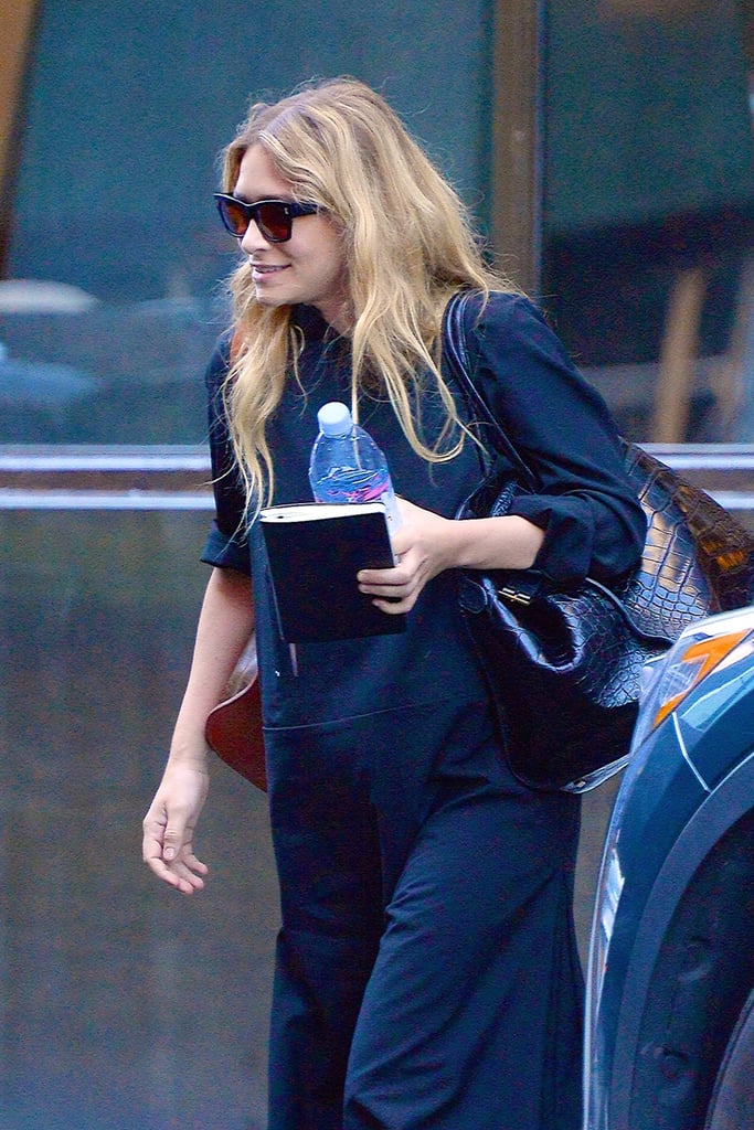 Ashley Olsen in Black Flip-Flops and Maxi Dress July 2018