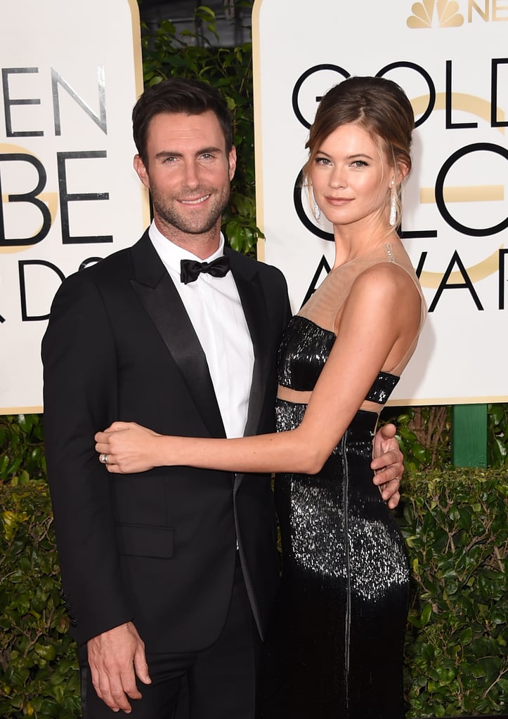 Behati Prinsloo and Adam Levine Cutest Moments Pictures