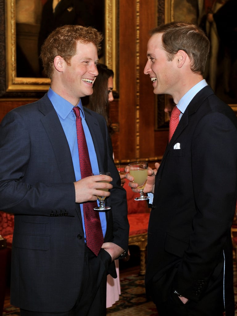 Will and Harry shared a laugh (and a drink) during a reception at Windsor Castle in May 2012.