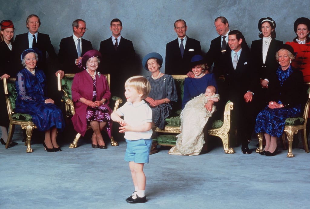 Both Queen Elizabeth II and Princess Diana can't help but smile as Prince William shows off during their christening portrait for Prince Harry in 1984.
