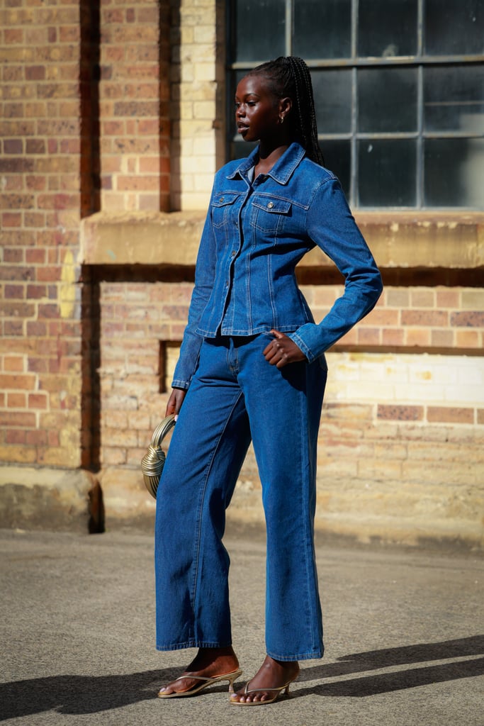 A guest wore double denim with kitten-heeled thongs and minimal accessories to keep the focus on the outfit.