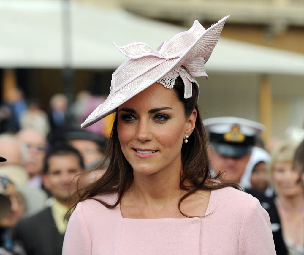 Kate's pink Jane Corbett hat was perfectly suited to her Emilia Wickstead dress at a garden party at Buckingham Palace in 2012.