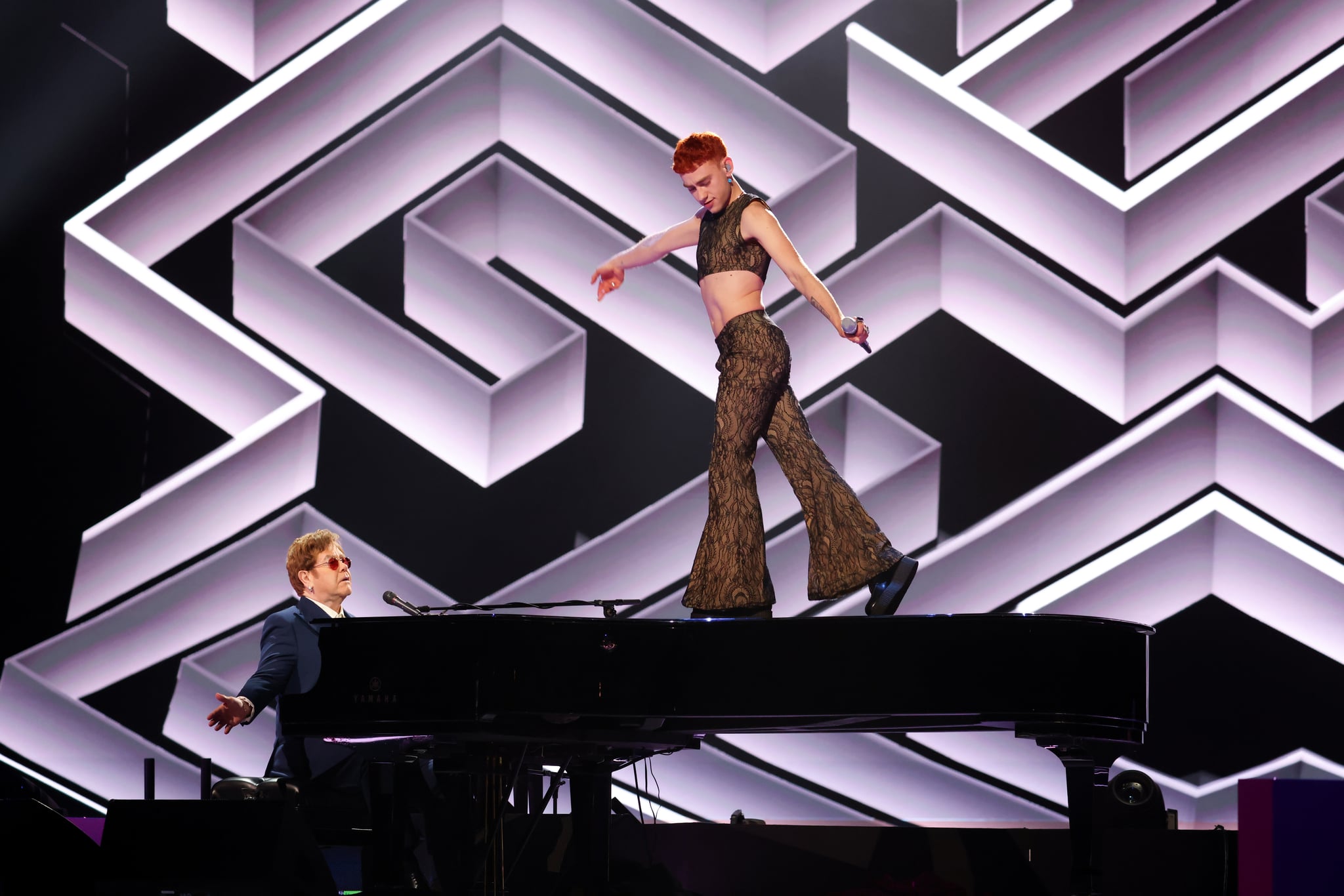 olly alexander performs with sir elton john at brits 2021 popsugar entertainment