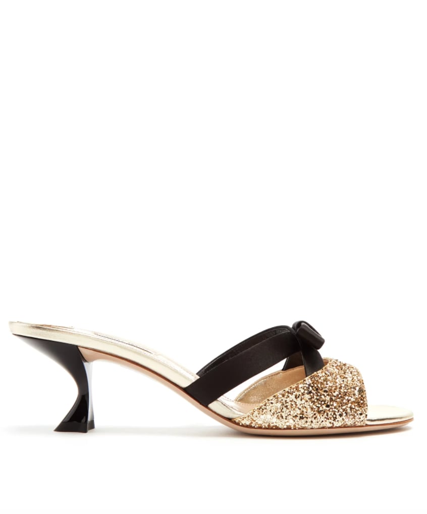 Click here to buy Miu Miu Bow-embellished glitter pumps at  MATCHESFASHION.COM