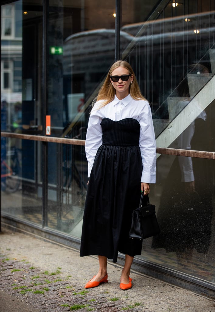 Outfit idea: Try wearing your strapless cocktail dress over a button-down to play into the regencycore romance. Finish with flats to keep it casual enough for daytime.