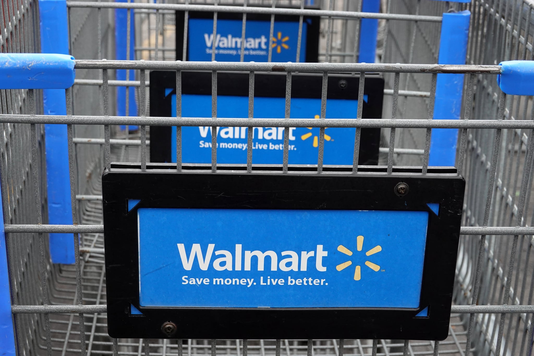 CHICAGO, ILLINOIS - MAY 19: Shopping carts sit in the parking lot of a Walmart store on May 19, 2020 in Chicago, Illinois. Walmart reported a 74% increase in U.S. online sales for the quarter that ended April 30, and a 10% increase in same store sales for the same period as the effects of the coronavirus helped to boost sales. (Photo by Scott Olson/Getty Images)