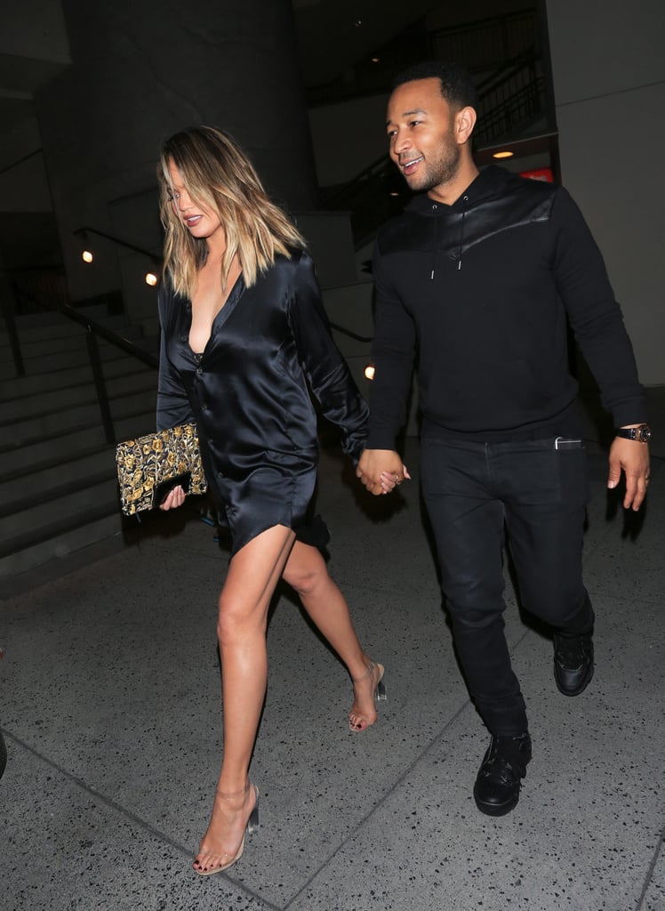 Chrissy Teigen Wearing a Black Satin 