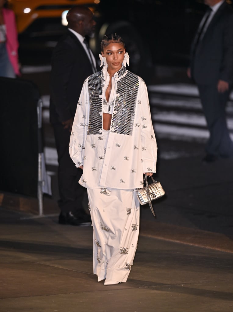 Lori Harvey's Crystal Coat and Maxi Skirt | Photos