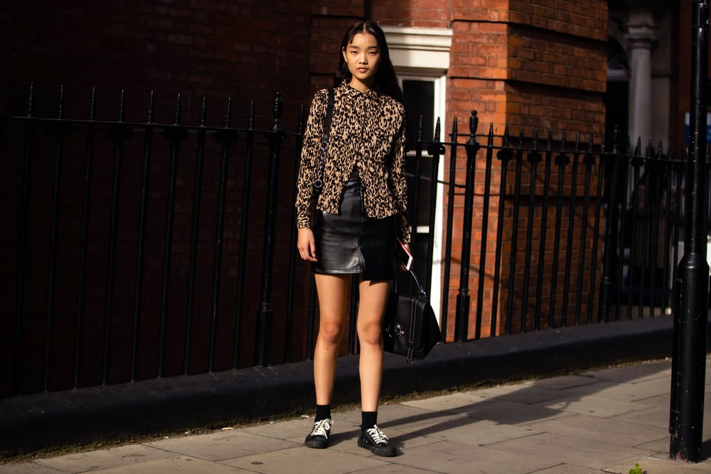 A printed blouse and leather skirt are perfect for date night.