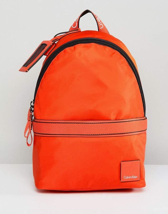 Gigi Hadid Carries Orange Furla Backpack