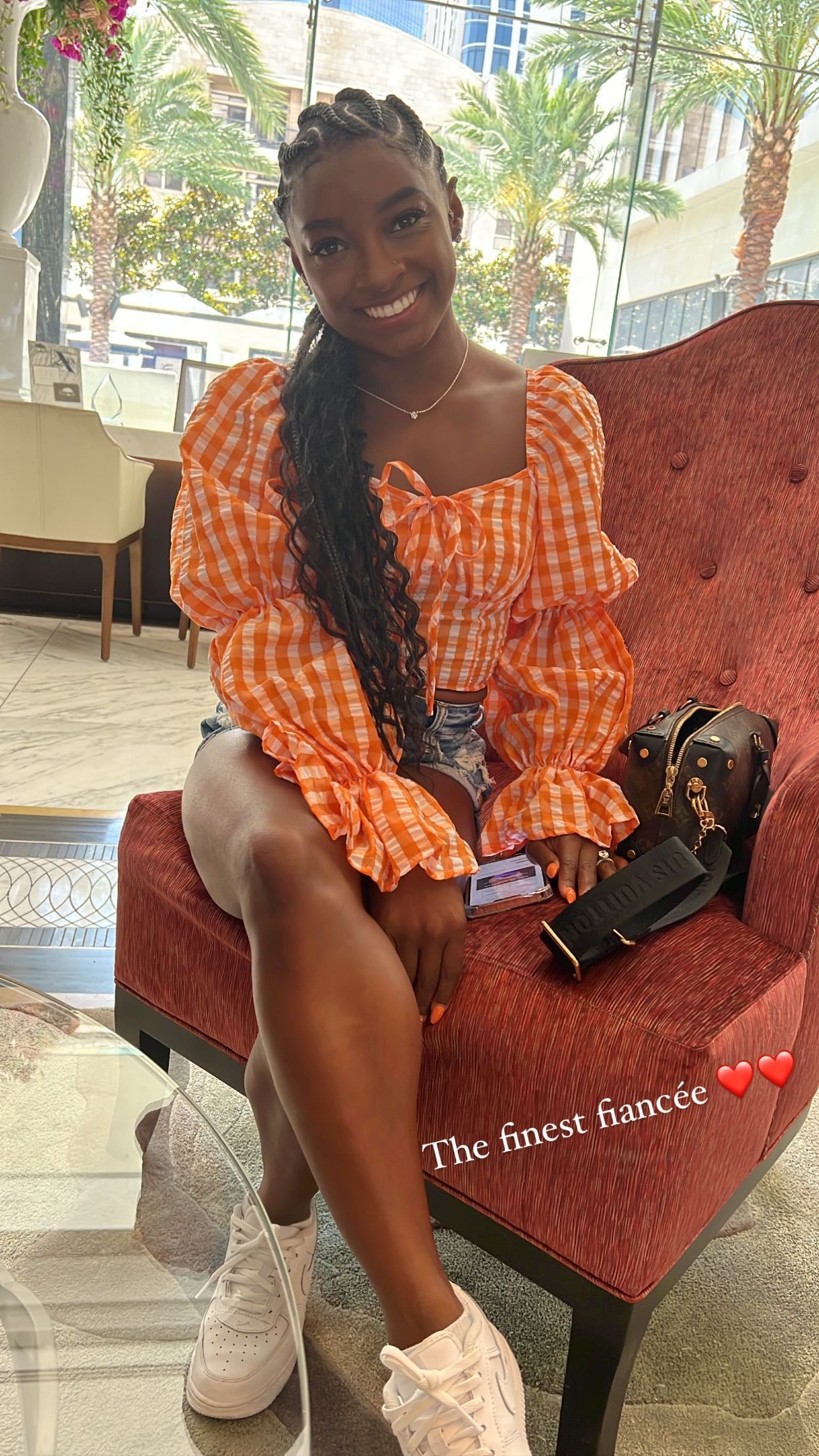 Simone Biles Wears an Orange Gingham Corset Top on Instagram