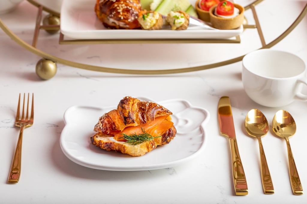 Smoked salmon and dill cream cheese on a pretzel croissant.