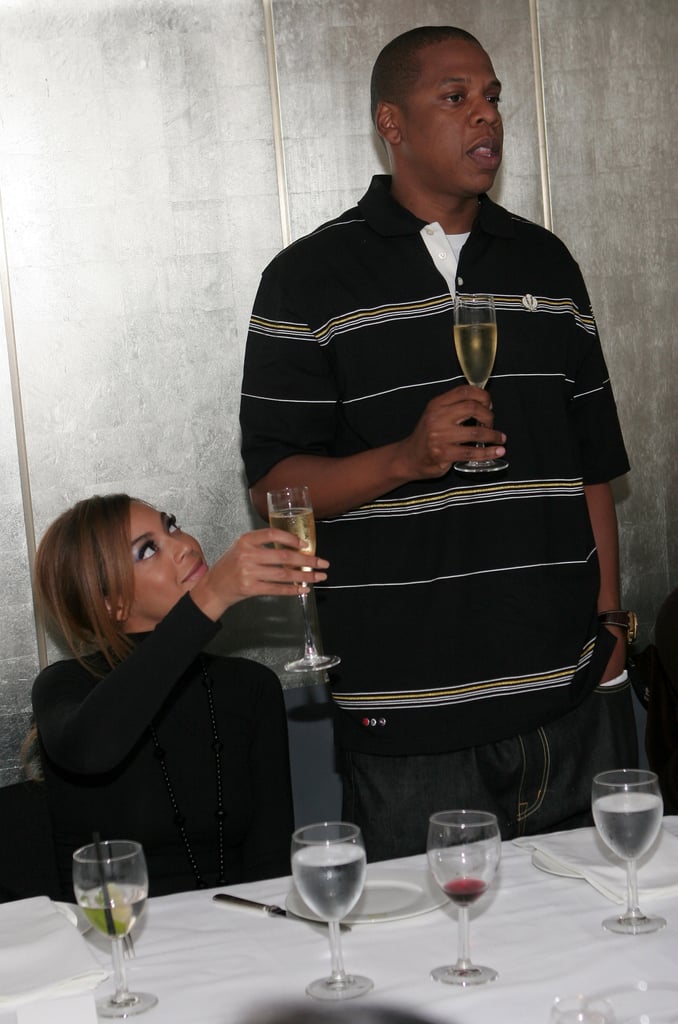 During a celebratory NYC dinner in May 2006, Jay Z proposed a toast, while Beyoncé Knowles raised her glass.