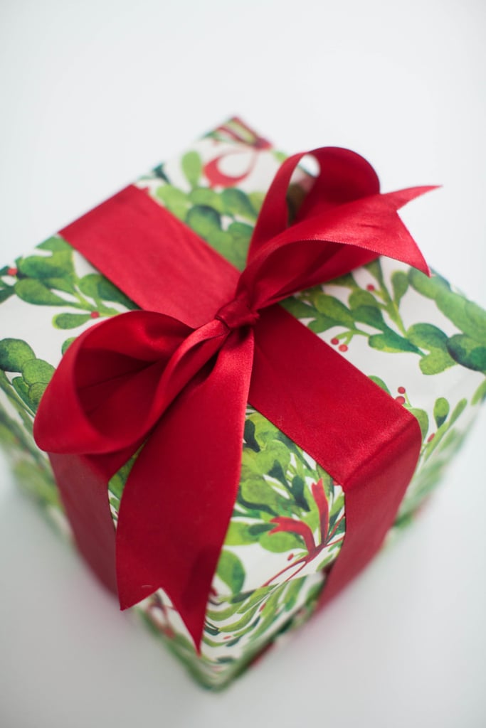 Use Leftover Wrapping Paper as a Photo Booth Backdrop