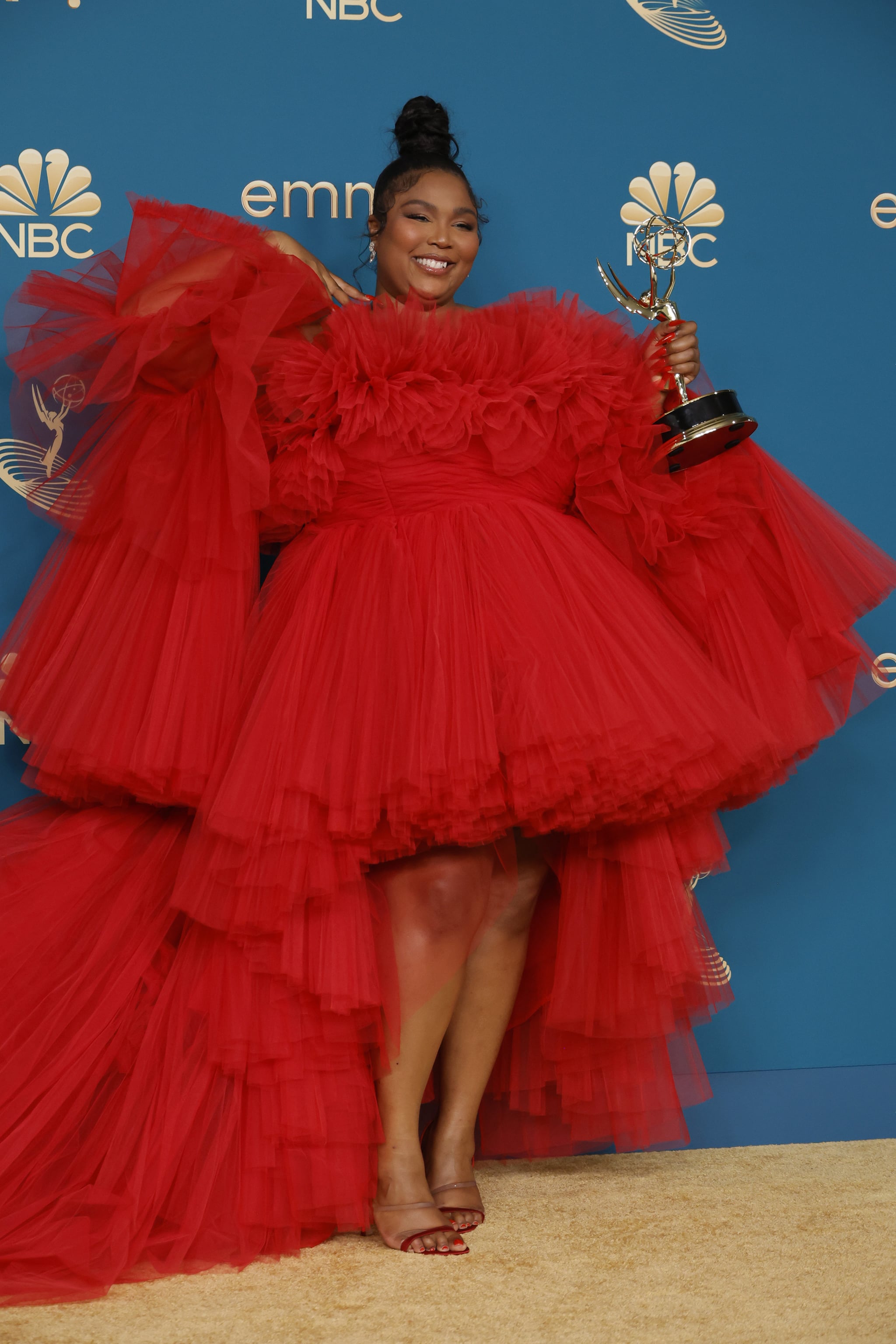 LOS ANGELES, CALIFORNIA - SEPTEMBER 12: Lizzo, winner of the Outstanding Competition Program award for 'Lizzo's Watch Out for the Big Grrrls,' poses in the press room during the 74th Primetime Emmys at Microsoft Theatre on September 12, 2022 in Los Angeles, California. (Photo by Frazer Harrison/Getty Images)