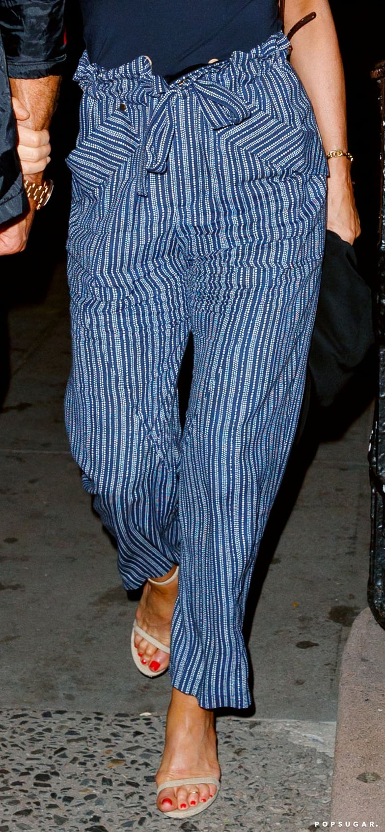 She Styled the Belted Pants With a Pair of Ankle-Strap Sandals