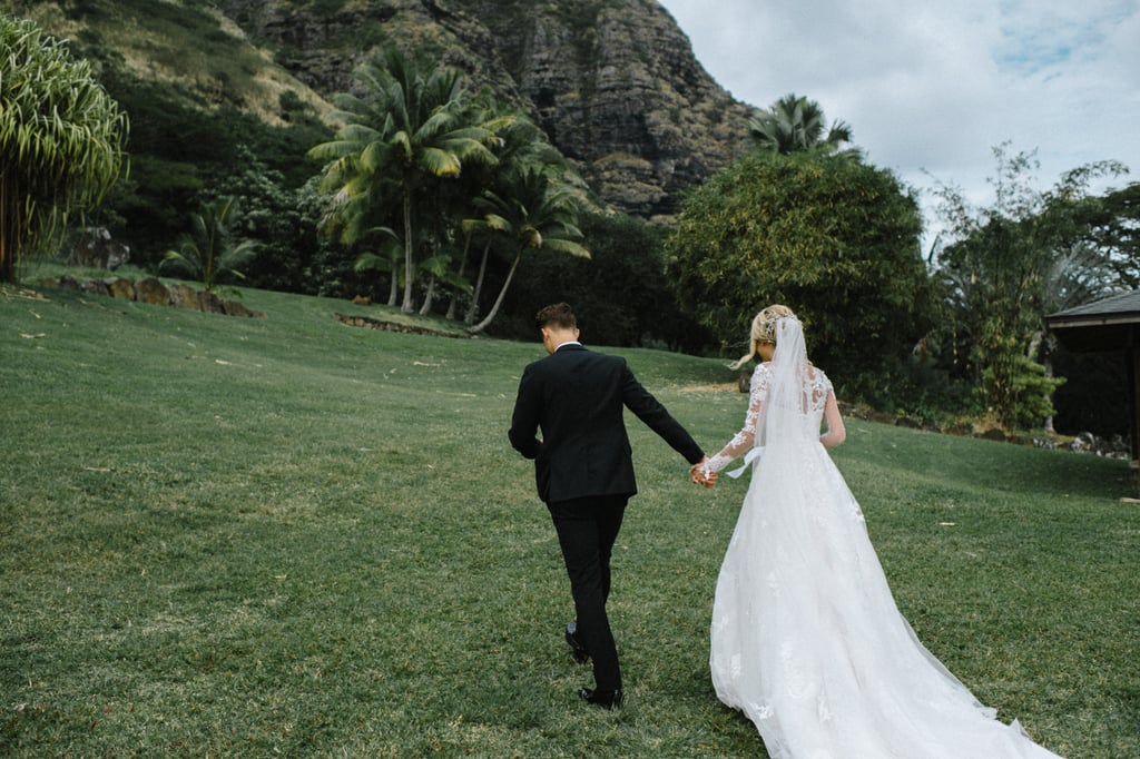 Couple Takes Wedding Photos in Bouncy Castle
