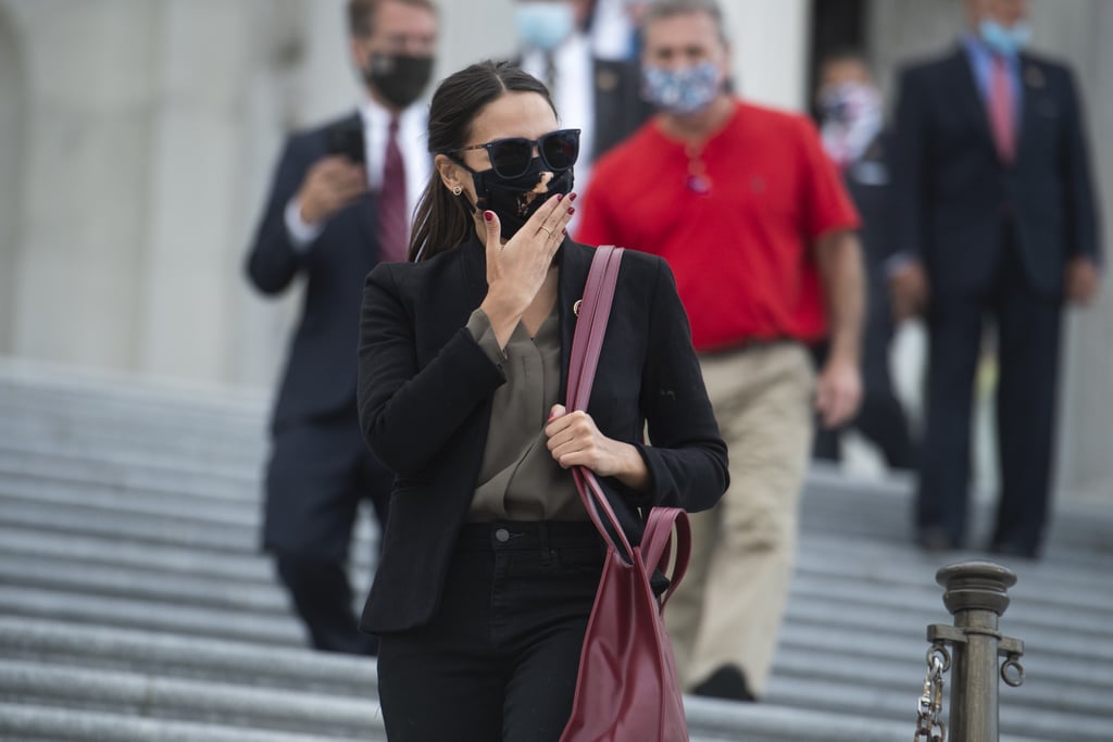 Alexandria Ocasio-Cortez Carrying Red Telfar Shopping Tote