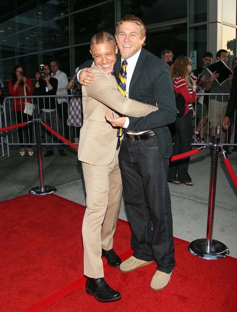 Charlie Hunnam gave his Sons of Anarchy costar Theo Rossi a big hug at the show's season four premiere in LA in 2011.