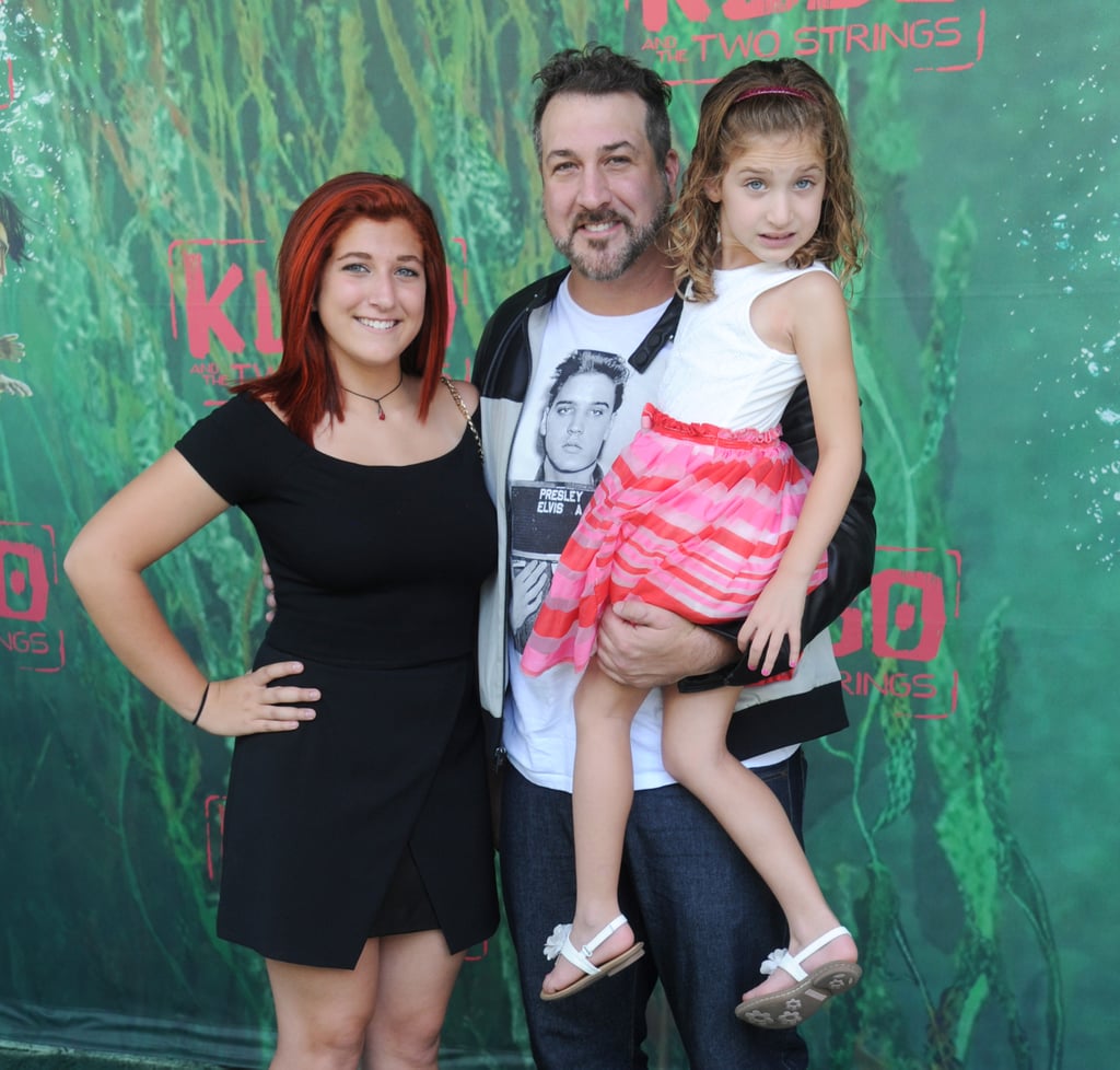 Joey Fatone turned the LA premiere of Kubo and the Two Strings into a family affair when he arrived with his two daughters, Briahna and  Kloey, by his side, on Sunday. The former *NSYNC singer, who recently reunited with his old band, proudly posed for photos alongside his two girls on the red carpet before making his way inside the movie theater. Also in attendance was Fuller House star Jodie Sweetin, who also brought along her fiancé, Justin Hodak, and her two daughters, Beatrix and Zoie. Check out even more stars who went from boy bander to doting father.