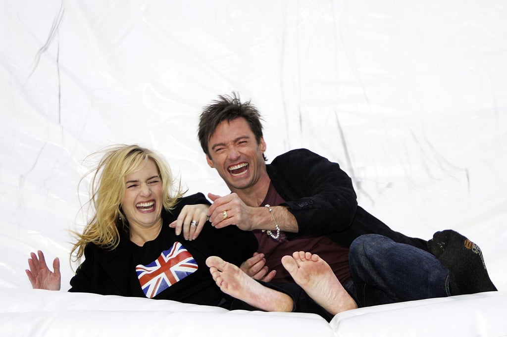 Kate Winslet and Hugh Jackman were caught clowning around during an October 2006 press event in NYC.