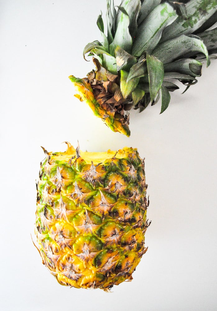 Step 2: Remove the head of the pineapple.