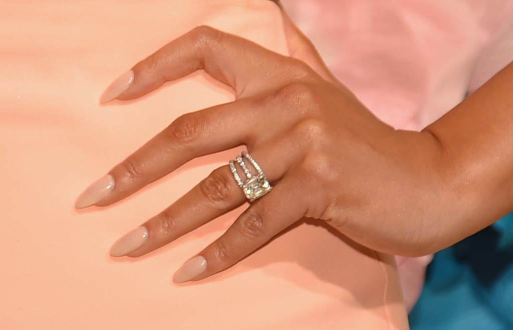 Chrissy Teigen Wearing Her Engagement Ring With Two Pavé Bands