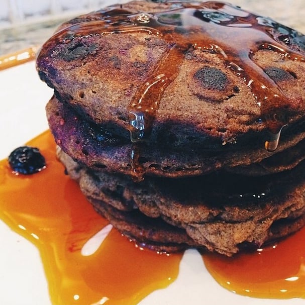 Topping your pancakes with maple syrup can actually help with muscle recovery and offer essential nutrients like zinc and iron; how sweet is that?
Source: Instagram user the_vegansisters