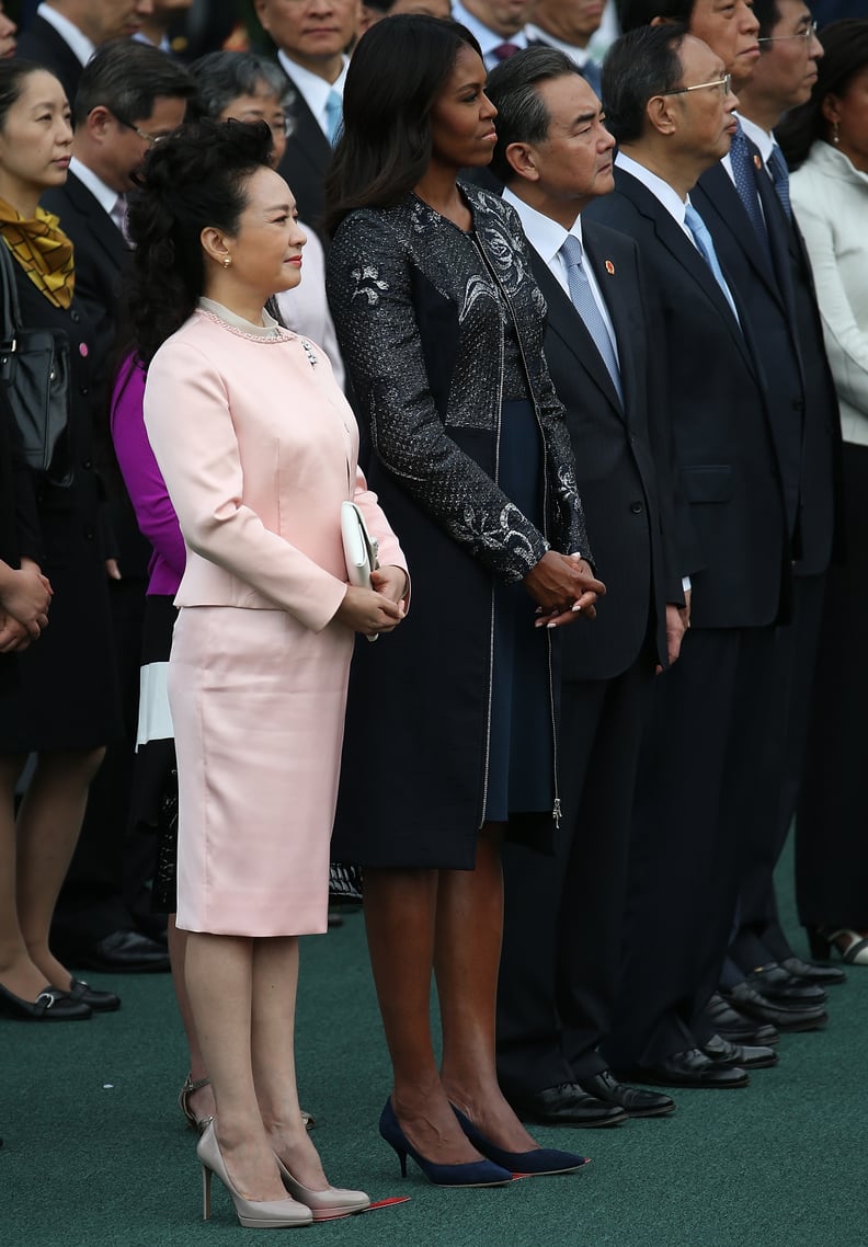 She Looked Extremely Sophisticated in Baby Pink Next to Michelle Obama