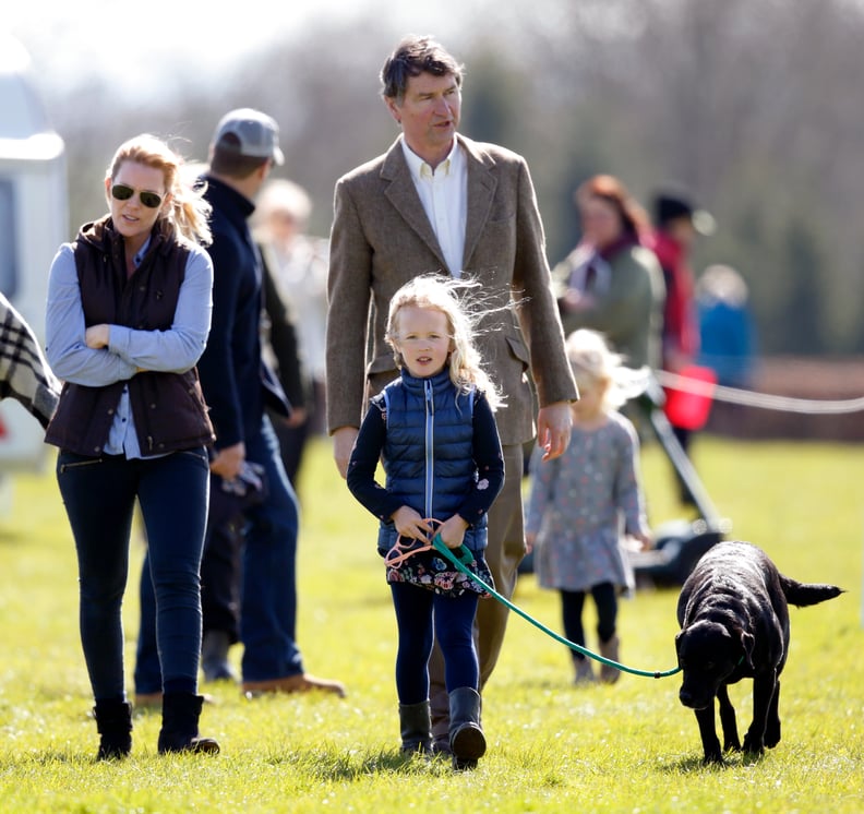 Autumn and Savannah Phillips With the Family's Black Lab