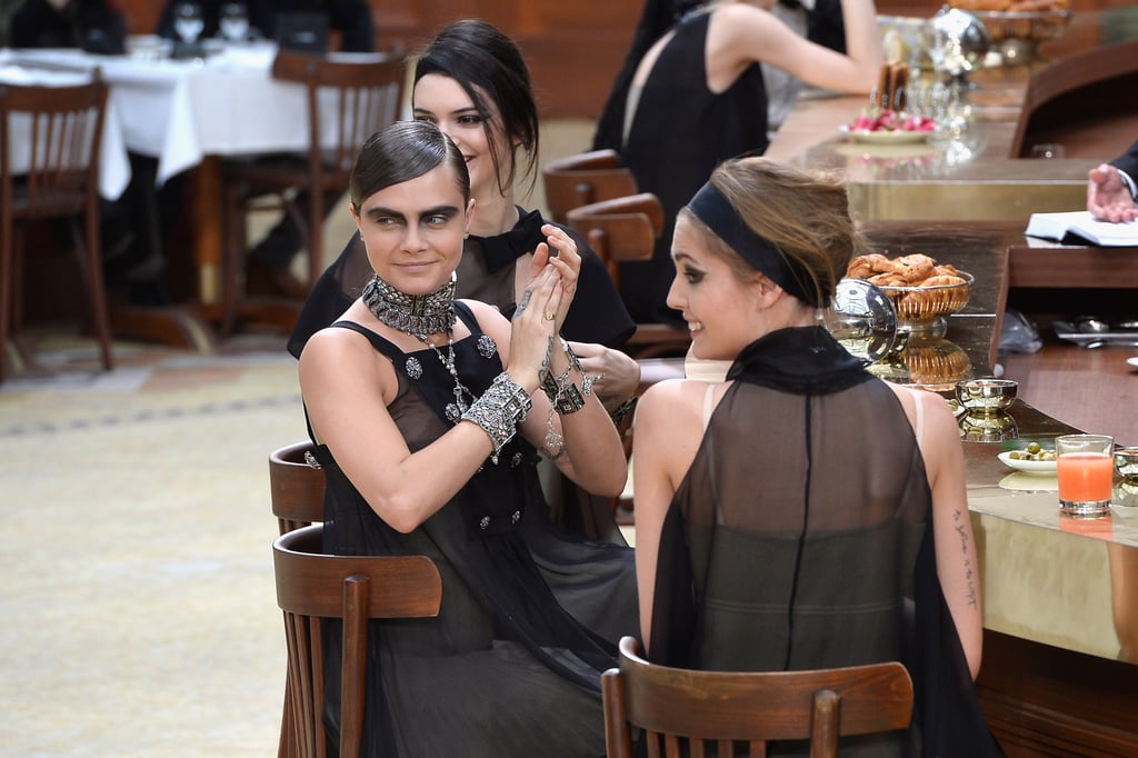 Cara dined with fellow models as part of the Paris Fashion Week Fall '15 show.