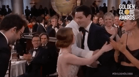 When Emma Stone Got Caught in the Middle of a Weird 3-Way Hug