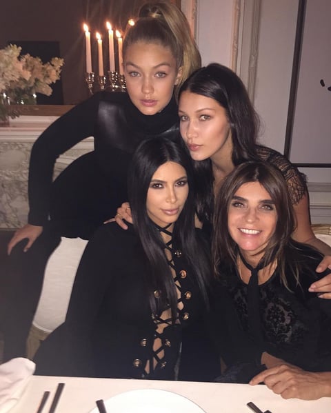 Kim Kardashian Instagrammed a photo from Carine Roitfeld's dinner with the caption, "Girls Girls Girls Girls @carineroitfeld @gigihadid @bellahadid." Gigi attended the party with her sister Bella.