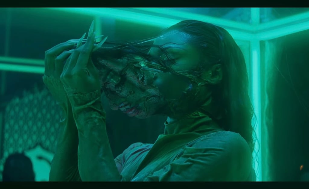 Megan Thee Stallion's "Cobra" Video Outfits: Green, Wet-Look Dress