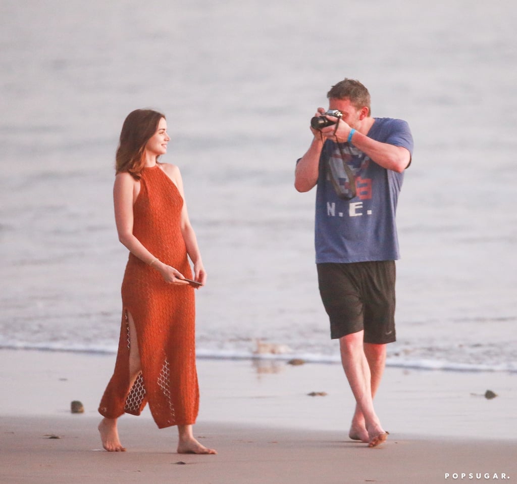 After much speculation, Ben Affleck and Ana de Armas seemingly confirmed romance rumors during their recent romantic getaway in Costa Rica. On March 10, the 47-year-old actor and 31-year-old Cuban star looked smitten while taking a walk on the beach. In addition to snuggling up to one another, Ben took a page out of Leonardo DiCaprio's book and played Instagram boyfriend as he snapped photos of Ana by the water. And now, Ana has given us a peek at those photos. On Tuesday, the actress shared an Instagram album with the gorgeous snaps, simply captioning it, "✨🧡."
Ben and Ana recently wrapped filming for their upcoming erotic thriller, Deep Water, which is based on the novel of the same name by Patricia Highsmith and hits theaters on Nov. 13. The pair play husband and wife in the movie, so perhaps that's when the sparks first flew between them. They were also just spotted together in Cuba. Neither Ben nor Ana has publicly confirmed the status of their relationship, but according to People, "they are definitely dating." See more of Ben and Ana's beach day ahead. 

    Related:

            
            
                                    
                            

            Ana de Armas Looks Happiest in a Swimsuit — Her Instagram Proves It