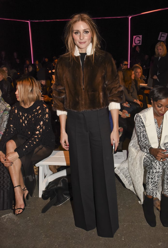 Olivia paired a furry bomber with wide-legged trousers at the Milly runway show in New York City.