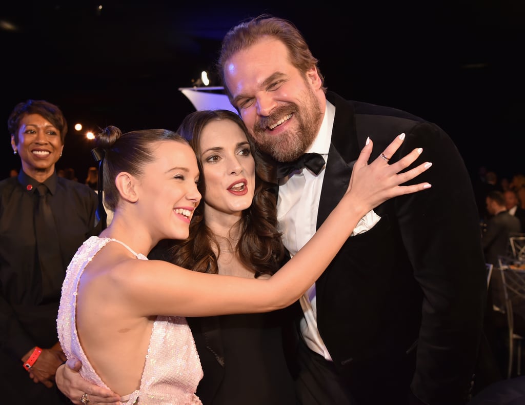 Pictured: Millie Bobby Brown, Winona Ryder, and David Harbour