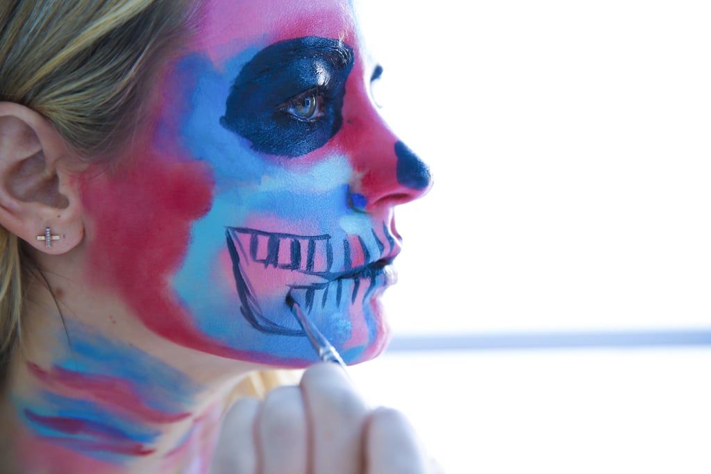 Time for the teeth! Where the last vertical line on your lips ends, start drawing small rectangles, extending out toward the wishbone you created earlier. Make the teeth on both the top and bottom, and leave room in between to fill in with black. Do this for both cheeks.