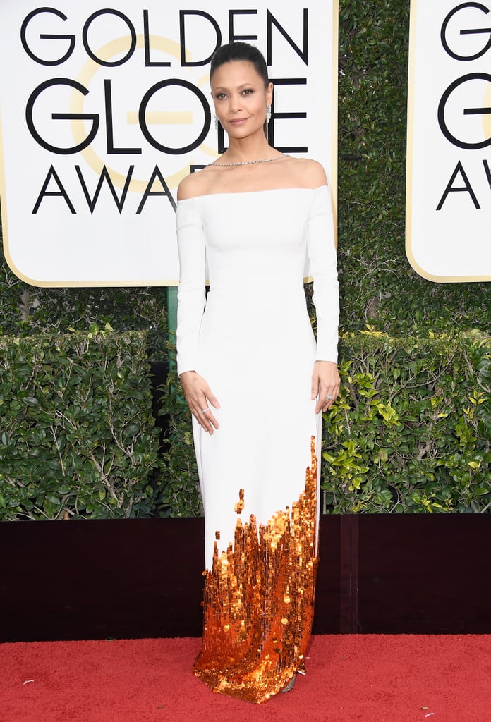 Thandie Newton in a off-the-shoulder white Monse dress with a dramatic hem, Jimmy Choo shoes, and more than 75 carats of Harry Winston diamonds in 2017.