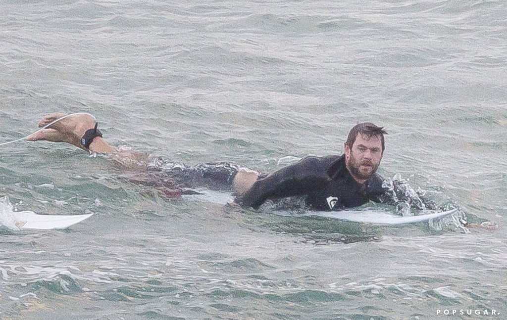 Liam Hemsworth Taking Pictures of Chris Surfing in Australia